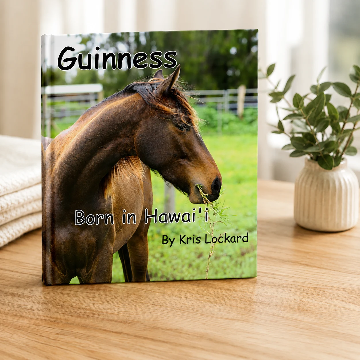 Guinness Born in Hawaii by Kris Lockard children's book about a horse sitting on a side table